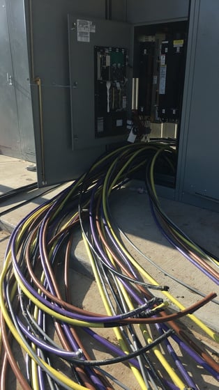 Large feeder cables routed into industrial switchgear by Adrian Electric