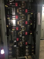 Inside an industrial distribution panel with terminated conductors