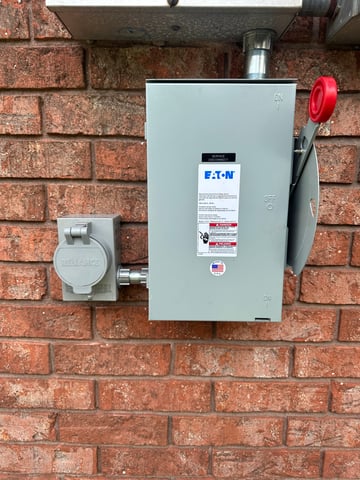 Exterior manual transfer switch with a power inlet box