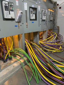 Commercial switchgear with feeder conductors being terminated
