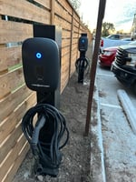 EV chargers installed in the parking area of an apartment complex in Wharton, TX