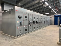 Industrial switchgear lineup in an electrical room
