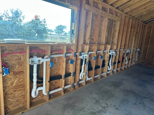 Shop wall rough-in with new boxes and conduit